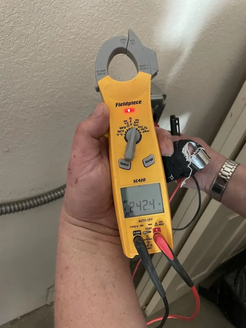 Voltage testing with clamp meter during Generator Installation in Hamilton
